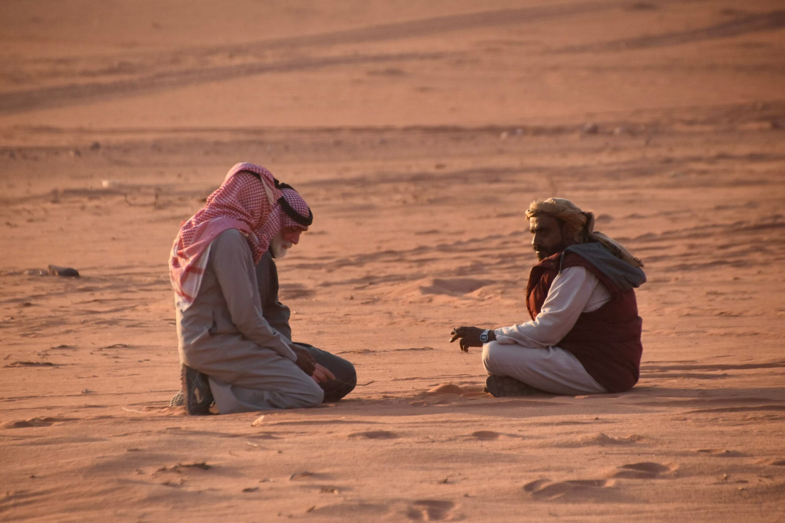 Bedouin drivers gathered to watch the sunset in Wadi Rum